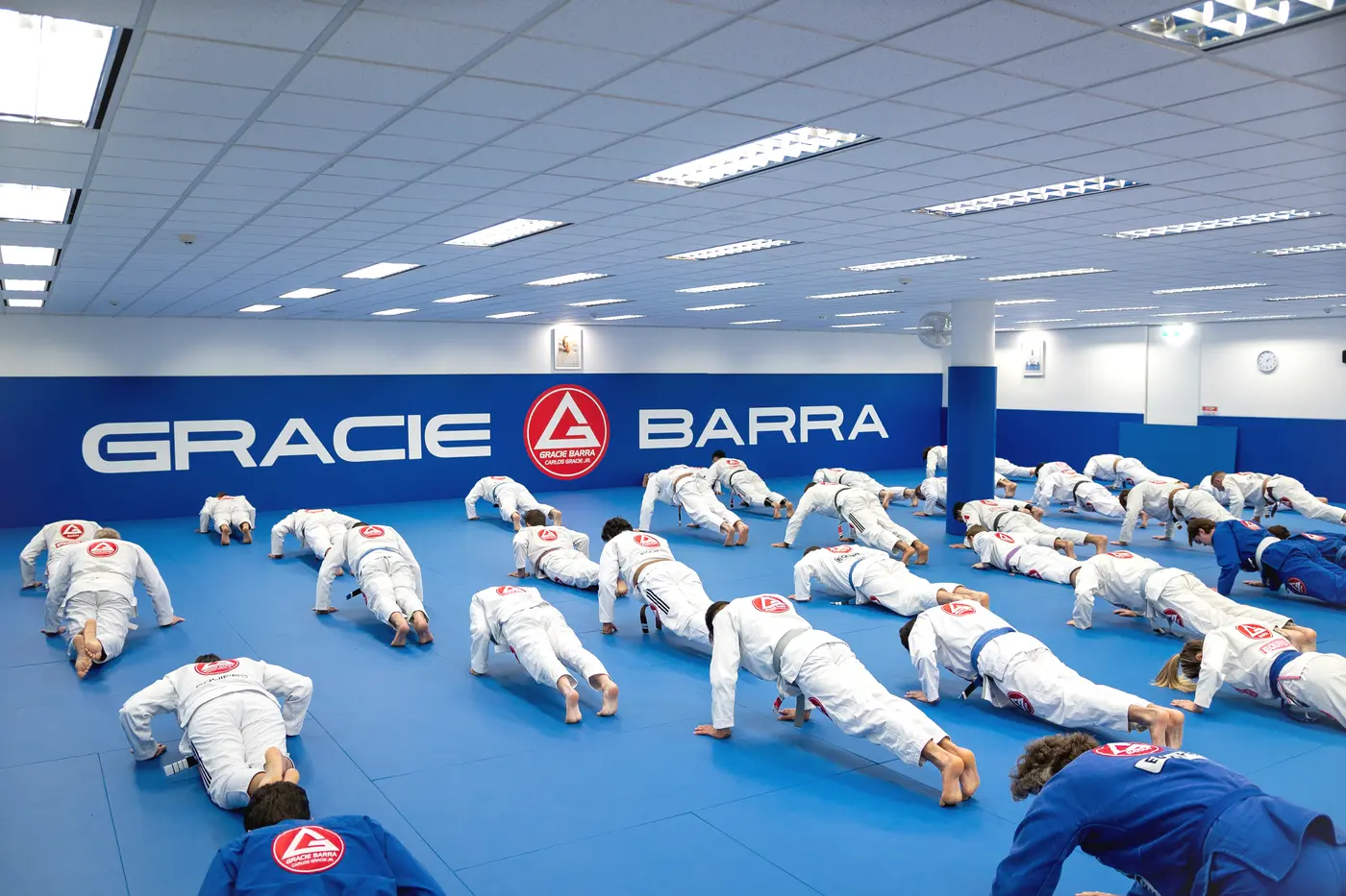 Children learning controlled Jiu-Jitsu technique