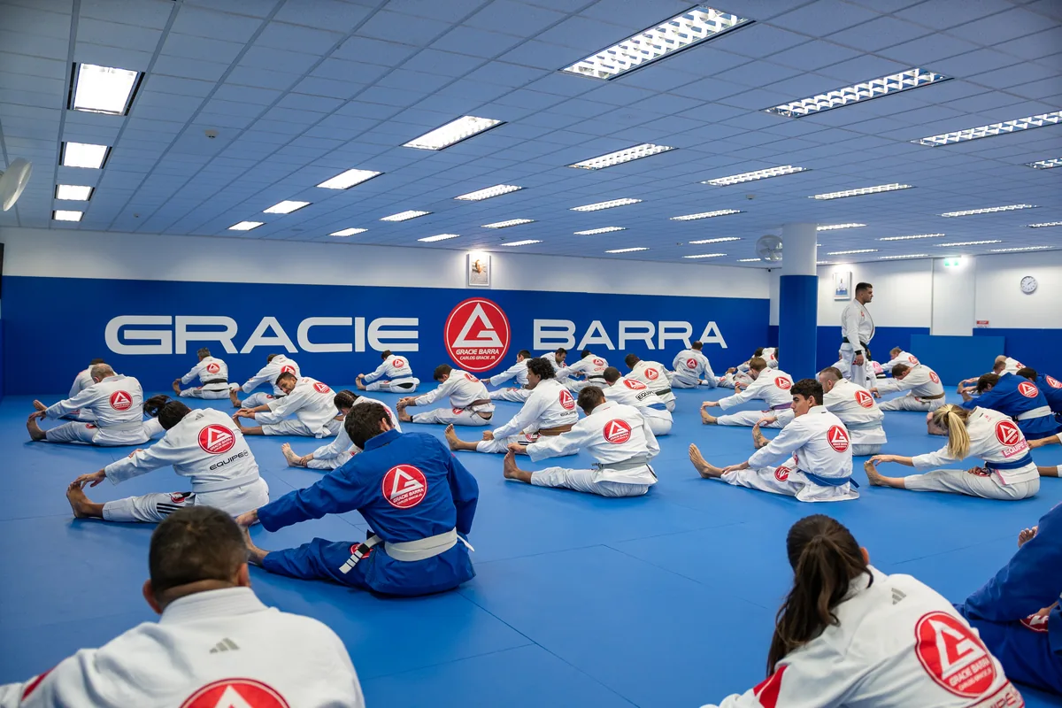 Students of different ranks following a group warm-up